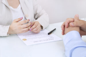 woman turned her husband wedding ring. Divorce concept